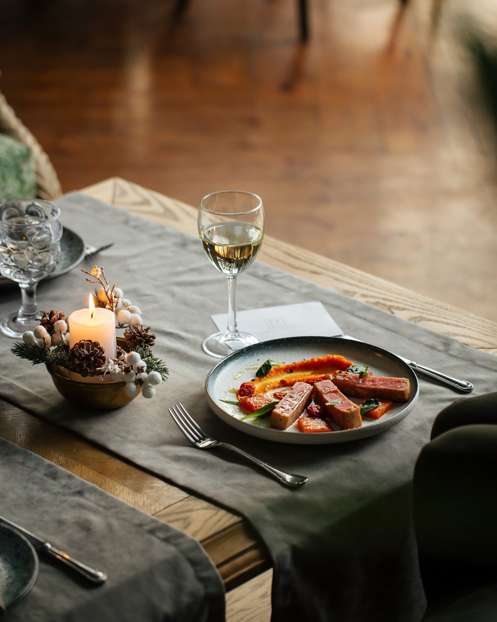 Gourmet roasted tuna with pumpkin puree on table